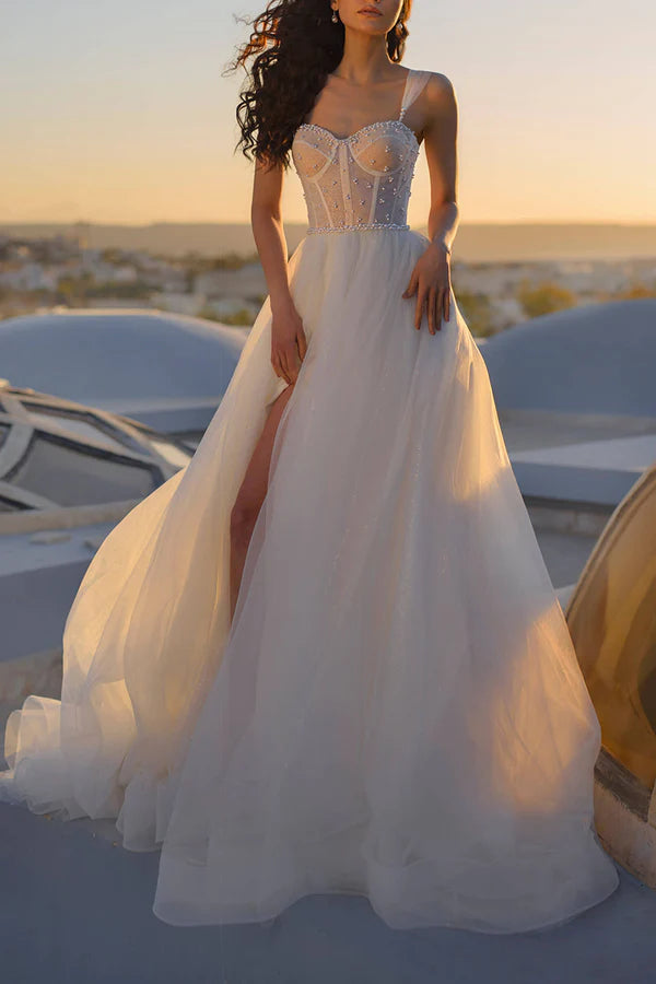 Abito da sposa a trapezio con scollo a cuore e perle in stile principessa